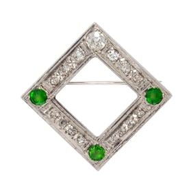 A diamond, tsavorite garnet and platinum brooch