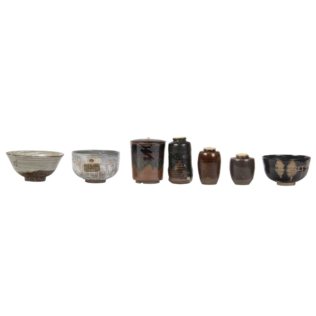 (lot of 7) Japanese glazed ceramic tea ceremony objects: (lot of 7) Japanese glazed ceramic tea ceremony objects. Consisting four jars and three bowls, from 2.625" to 4" high.
