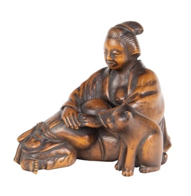 A Japanese boxwood figural group