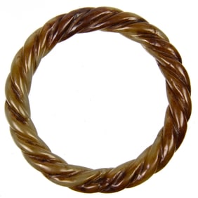 A Chinese celadon jade twisted rope bangle