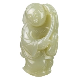A Chinese celadon jade boy