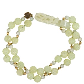 A Chinese white jade and hardstone necklace