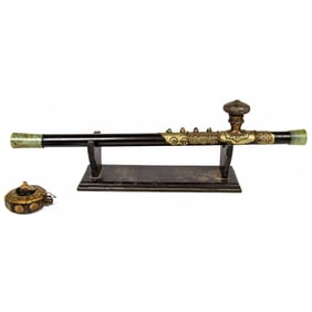 A Chinese hardwood opium pipe and opium box