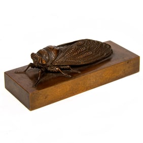 A Chinese bronze 'cicada' scroll weight