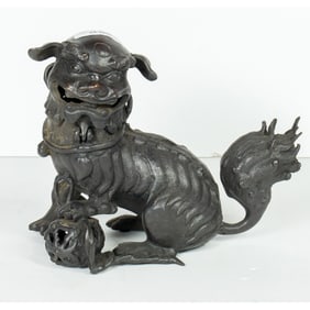 A Chinese bronze lion censer
