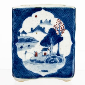 A Chinese blue and white square form brush holder