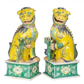 A pair of Chinese famille verte foo lion figures