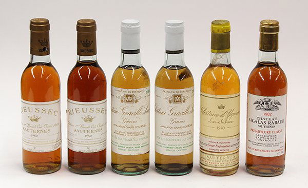 French wine group: (lot of 6) French wine consisting of 1980 Chateau d'Yquem, Sauternes, France, two 1985 Chateau Graville Lacoste Blanc, Graves, France, 1982 Chateau Sigalas Rabaud, Sauternes, France, two 1980 Chateau