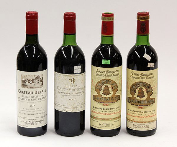 Saint-Emilion French wine group: (lot of 4) French wine consisting of 1979 Chateau Belair Saint-Emilion Grand Cru, France, 1981 Chateau Angelus, Saint-Emilion Grand Cru, France, 1982 Chateau Angelus, Saint-Emilion Grand Cru, France,