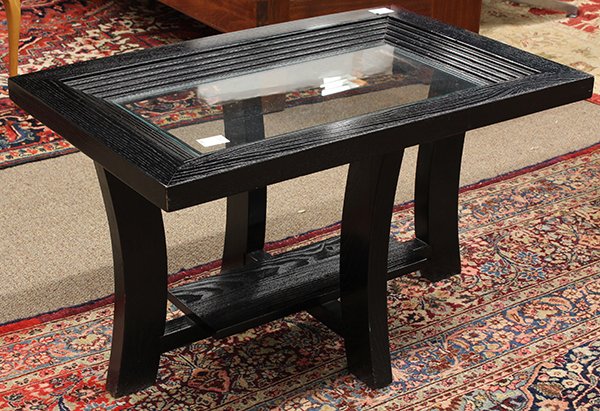 Pair of ebonized Paul Frankl occasional tables: Pair of ebonized Paul Frankl occasional tables, each with a rectangular top centered with a glass panel rising on outswept legs conjoined by the lower tier, each 20"h x 34"w x 22"d