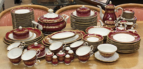 German porcelain china service: (lot of 123) German porcelain burgundy and gilt border china service including; 23 dinner plates 9.25", 24 salad plates 7.5", 11 bread and butter plates 6.75", 12 cups with saucers, 12 nut dishes, cof
