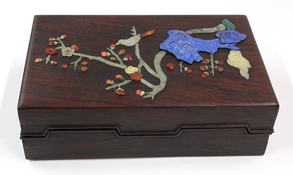Chinese Stone Overlaid Hardwood Box: Chinese hardwood box with stone inlays, the 'Vietnamese huanghuali' lid decorated with a a bird amid flowering prunus executed with various colored stones, 10.5"l