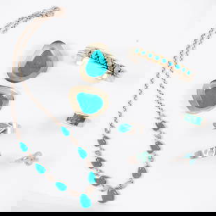 A turquoise and silver suite: A turquoise and silver suiteComprising a cuff, necklace, pendant and 4 rings; 83.63 grams gross