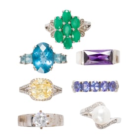 A group of gemstone and silver rings