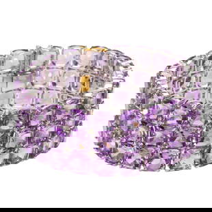 A amethyst diamond and silver bracelet: A amethyst diamond and silver braceletfeaturing numerous cushion-cut amethyst weighing approximately 134 carats, accented by single cut diamonds, in silver with 14k gold findings; 62.00 grams;