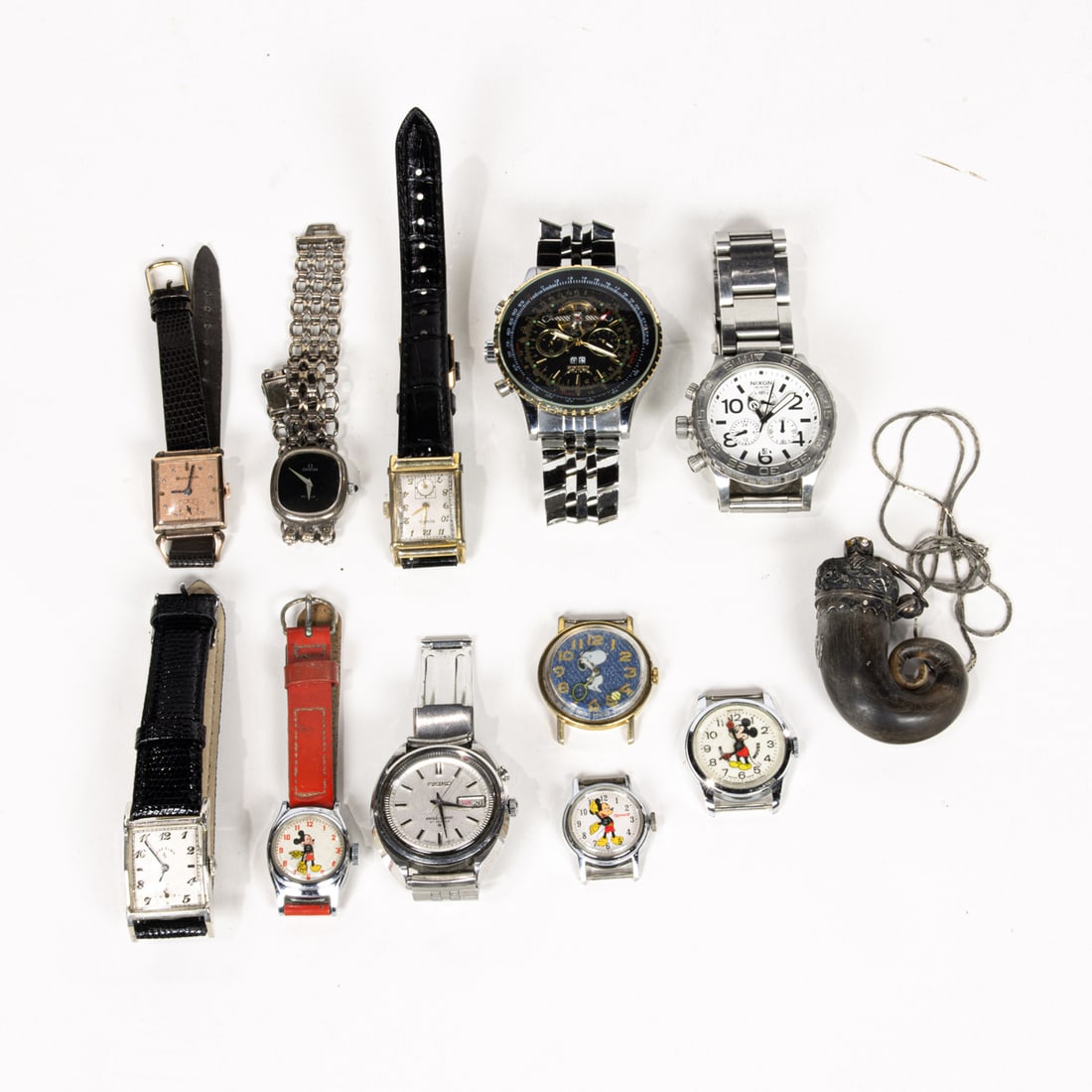 A bag of eleven watches, including a Nixon and Jaragar diving watches (1 of 1)