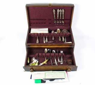 Two boxes, Community and International deep silver flatware