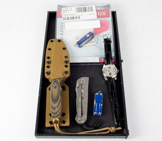Four Contemporary outdoor, utility and sporting knives with cases, including Chris Reeve Umnumzaan