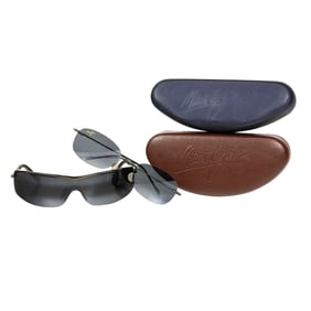 Two pairs of Maui Jim sunglasses, his and hers