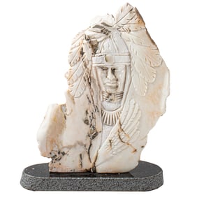 A Mike Toledo carved stone relief portrait