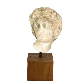 A cast stone head of lady, after the Antique