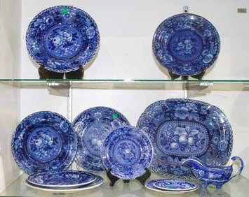 A group of Staffordshire blue and white transfer decorated pottery in various fruit and flower