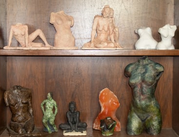 A collection of Contemporary sculptures of female figures in various mediums