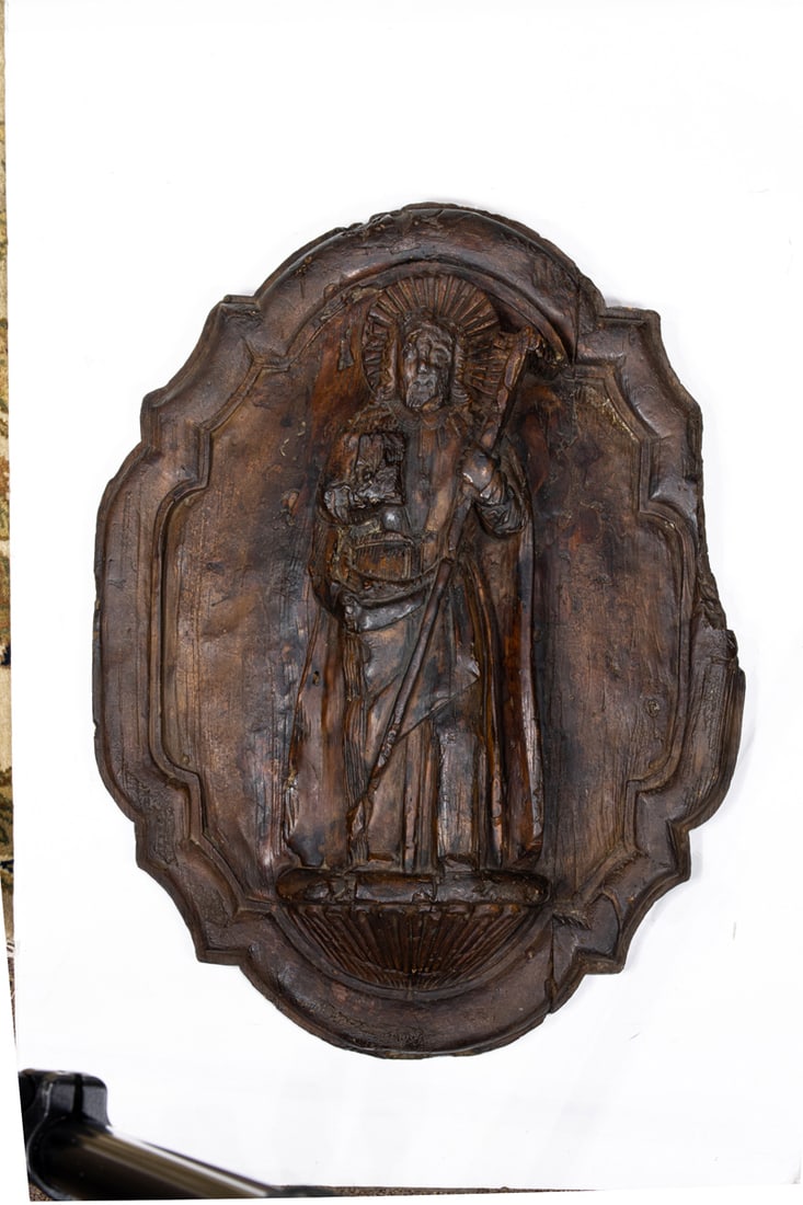 A Continental style carved relief plaque of a saint (1 of 3)