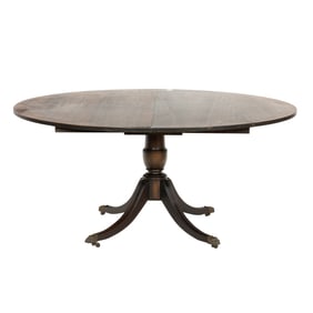 A Regency style mahogany dining table