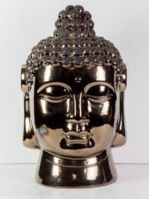 A Contemporary gilt metal buddha head