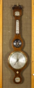 An English line inlaid mahogany wheel barometer