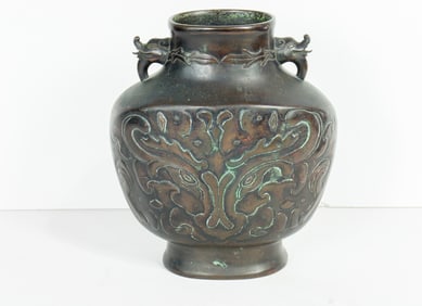 A Japanese patinated bronze vase
