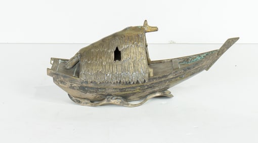 A Japanese bronze incense burner in boat form with removable cover