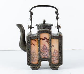 A Chinese pewter teapot