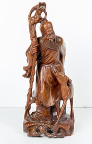 A Chinese hardwood carving of figure