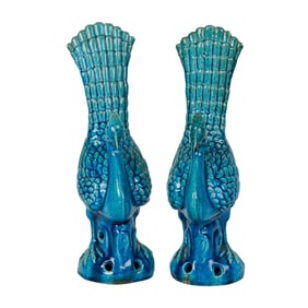 A pair of Chinese turquoise glazed peacocks