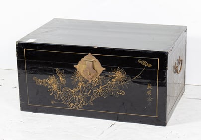 A Chinese black lacquered trunk