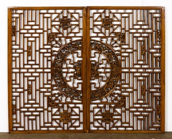 A pair of Chinese wooden windows