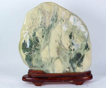 A Chinese viewing stone on wood stand