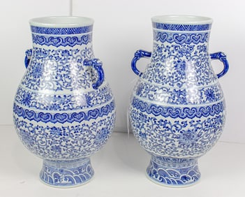A pair of Chinese blue and white hu-form vases
