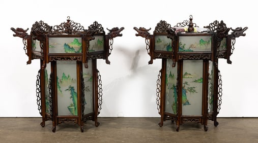 A pair of Chinese rosewood dragon-head lanterns with reverse glass landscape painting