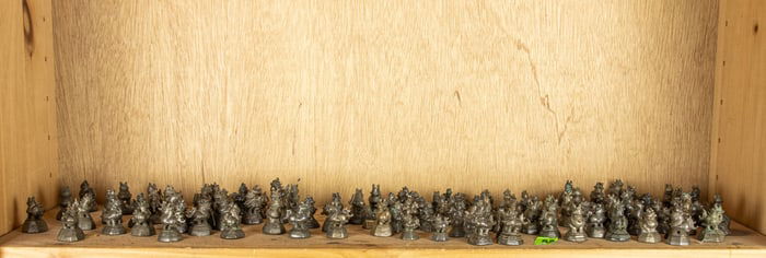 A shelf of Burmese bronze weights