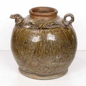 A Chinese glazed pottery wine jar