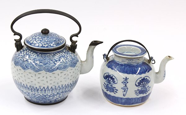 Two Chinese Porcelain Teapot for the Thai Market, 19th : (lot of 2) Chinese underglaze blue teapots, for the Thai market, 19th century, the first decorated with bats clasping onto a peach flanking a shou character, together with a dish lid (repaired spout);