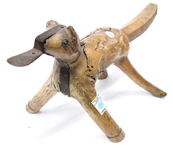 Two Thai Coconut Graters: (lot of 2) Thai coconut graters and splitters, made of hard wood and iron, one in the shape of a dog with green glass eyes, the other of a rabbit with a large bowl, largest:: 22"l