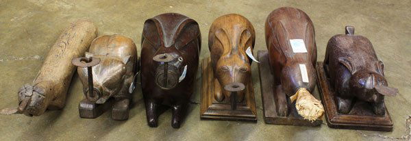 Six Southeast Asian Coconut Graters: (lot of 6) Southeast Asian and Thai coconut graters and splitters, of various animal shapes, consisting of four rabbits, one elephant and one with a slender elongated body, each made of hard wood and