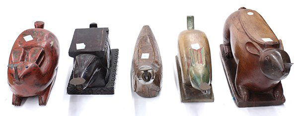 Five Thai Coconut Graters and Huskers: (lot of 5) Thai coconut graters and huskers, consisting of four rabbits and a mallard duck, made of hardwood and iron, longest: 20"l