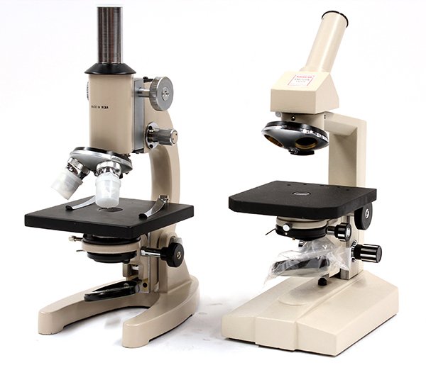 Laboratory microscopes: (lot of 2) Enameled laboratory microscope, made in India, together with a Tasco LM 1500 laboratory microscope and accessories, 13"h