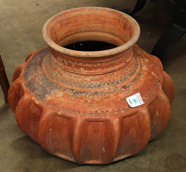 Southeast Asian earthenware jardiniere: Turkish earthenware jardiniere, the squat form having a wide everted rim set above a tapered neck and bulbous body with pronounced lobes and bands of stylized decoration, 14"h