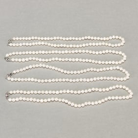 Four Strands of White Pearl Necklaces